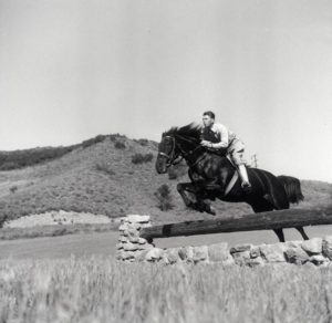 1950s Ronald Reagan jumping his horse Tar Baby at Malibu Canyon Ranch Yearling Row